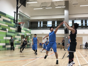 Wong Chung Yin of CIHE/CBCC took a three-point shot